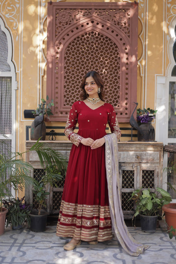 Outstanding Maroon Color Embroidery Zari Sequins Work Designer Gown