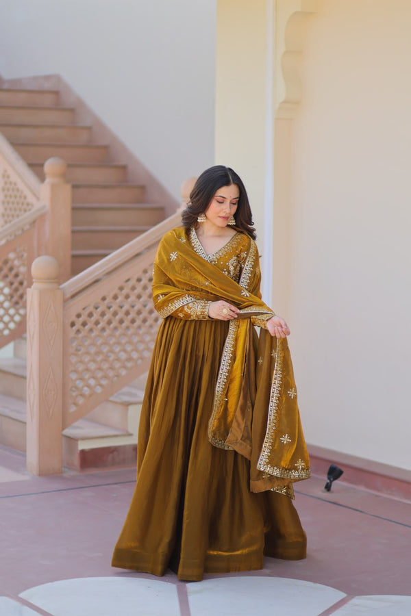 Festive Wear Mahendi Color Zari And Sequins Embroidered Work Designer Gown