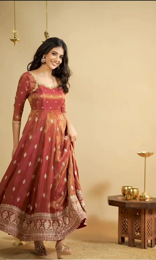 Saakshi`s Orange Color Cosmo Thread With Sequence Work Beautiful Anarkali Suit