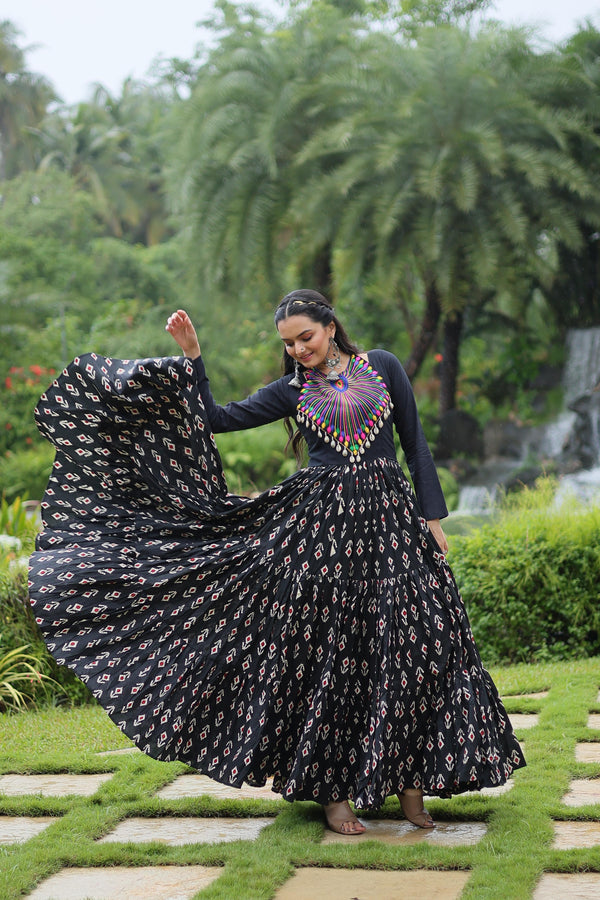 Festive Wear Printed Cotton With Kutchi Gamthi Work And 12 Meter Flair Black Color Navratri Gown